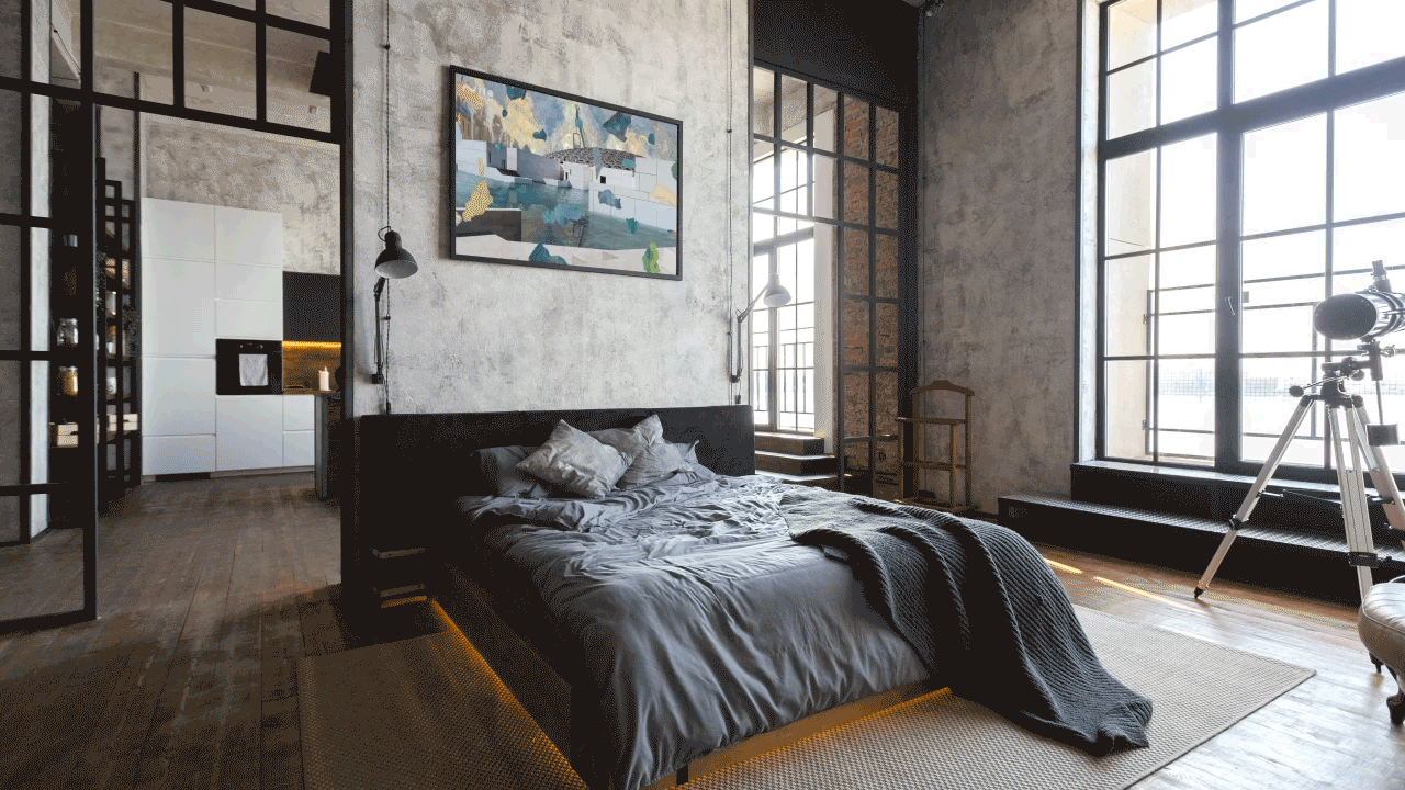 Hotel guest room with beautiful innovative interior design and a screen above the bed with the digital artwork: Cézanne Unfixed by Joe Hamilton, Powered by Niio